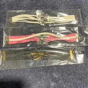 New in package set of 3 multi layer bracelets